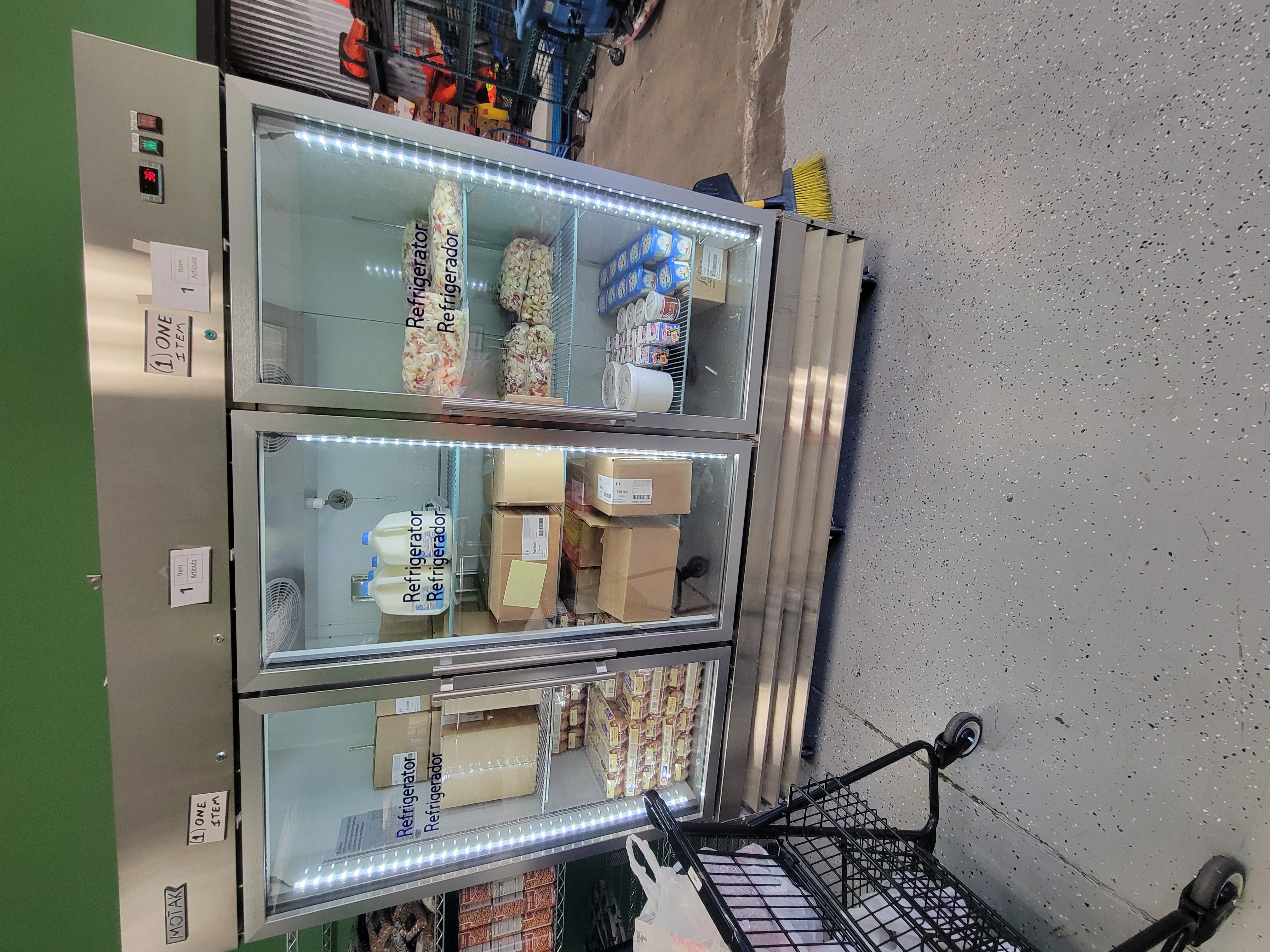 Dairy and produce filled fridge.